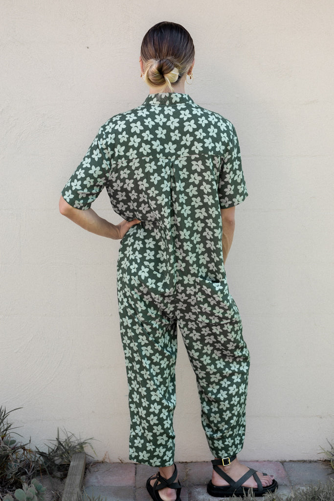 Billy Jumpsuit in Hawaiian Floral Green Print, short sleeve, full length jumpsuit with pockets and our signature shell buttons - Moon Flower - Back View